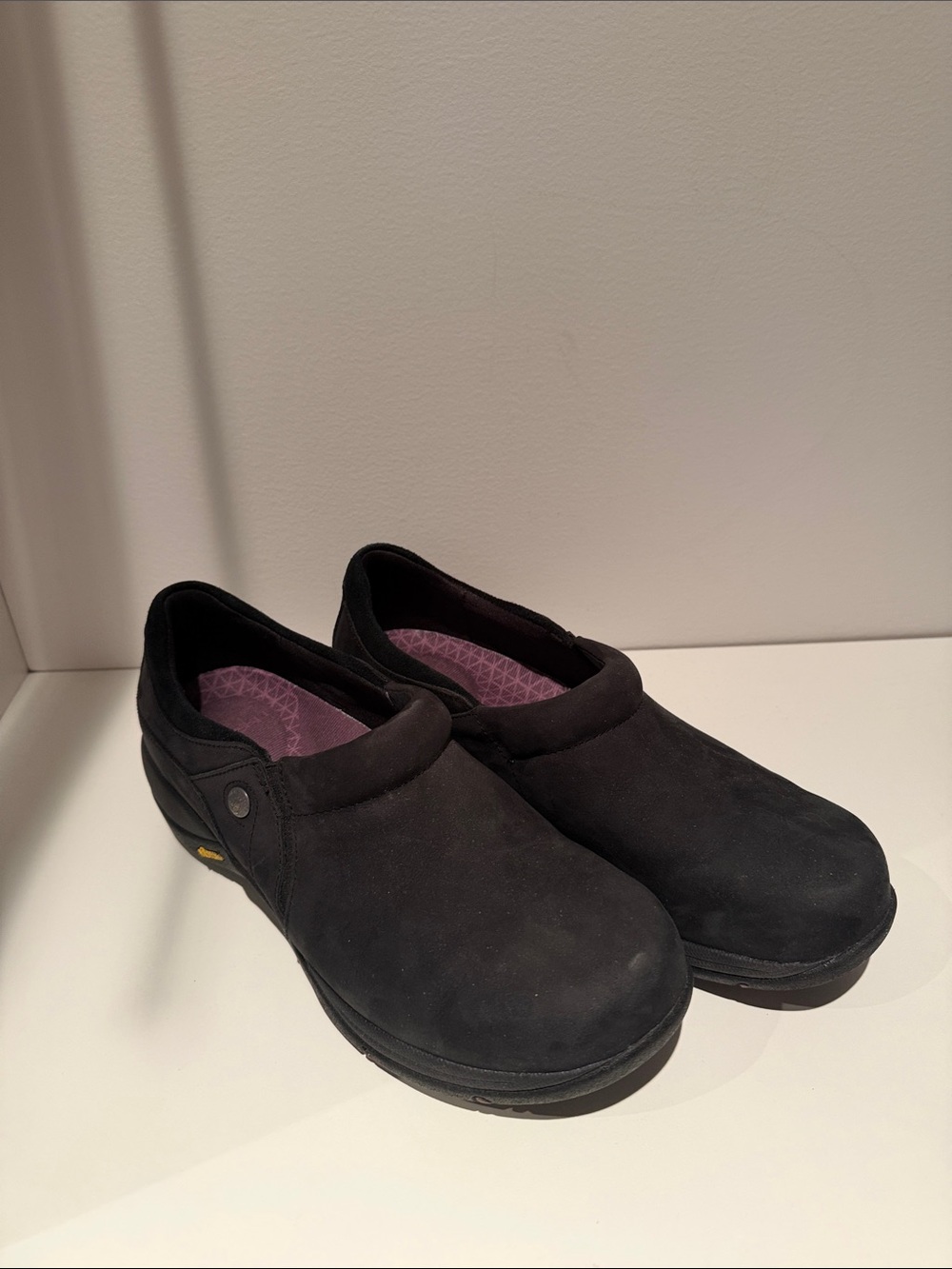 Dansko Black Slip-On Clogs with Purple Insole